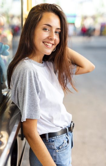 mid-shot-woman-smiling-camera mid-shot-woman-smiling-camera